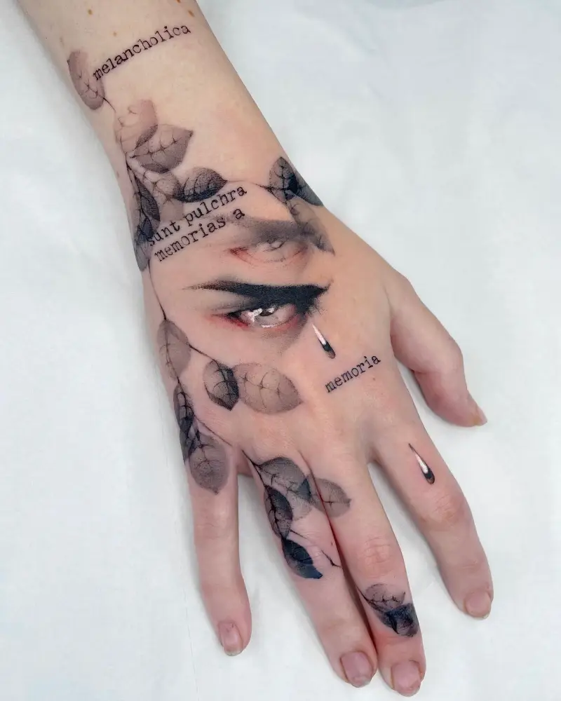 Surreal Portrait Collage Hand Tattoo