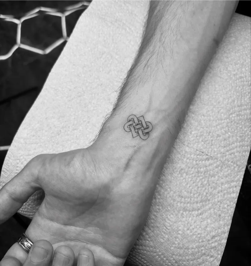 Tiny Celtic Knot Wrist Tattoo