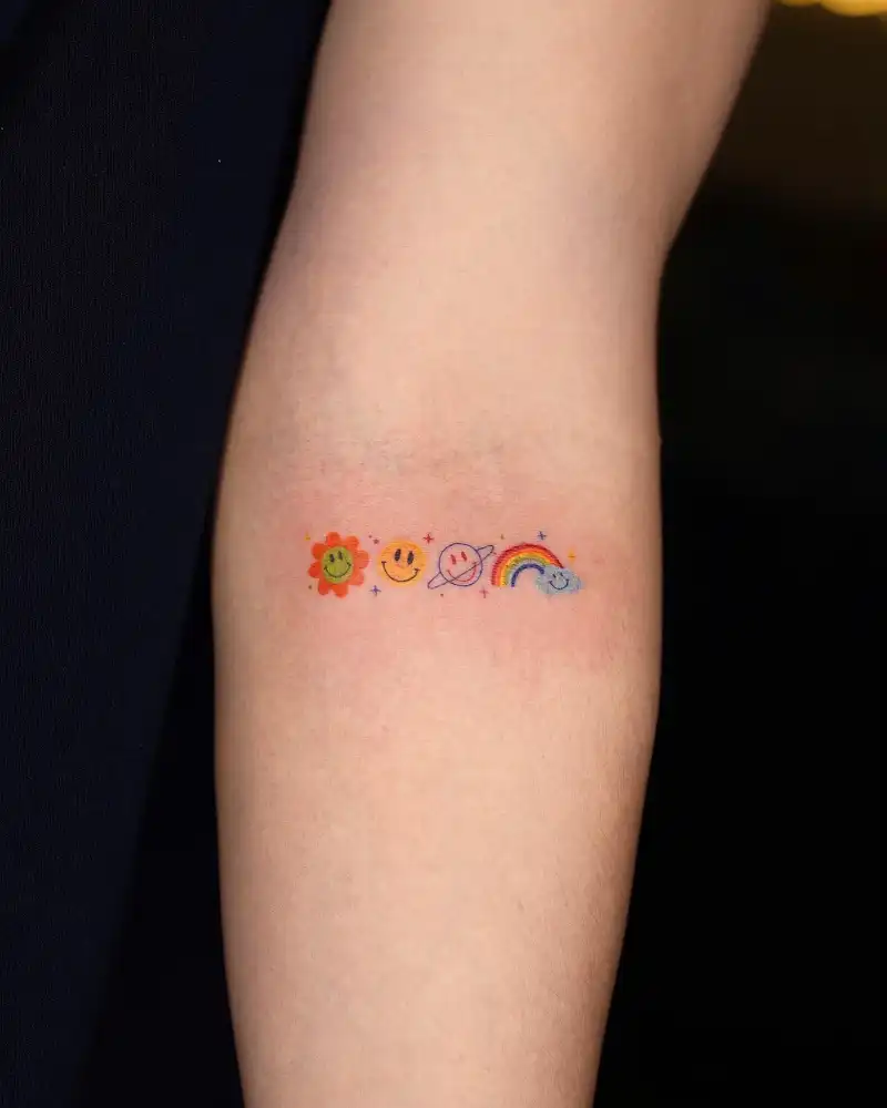 Tiny Smiley Faces Rainbow Tattoo