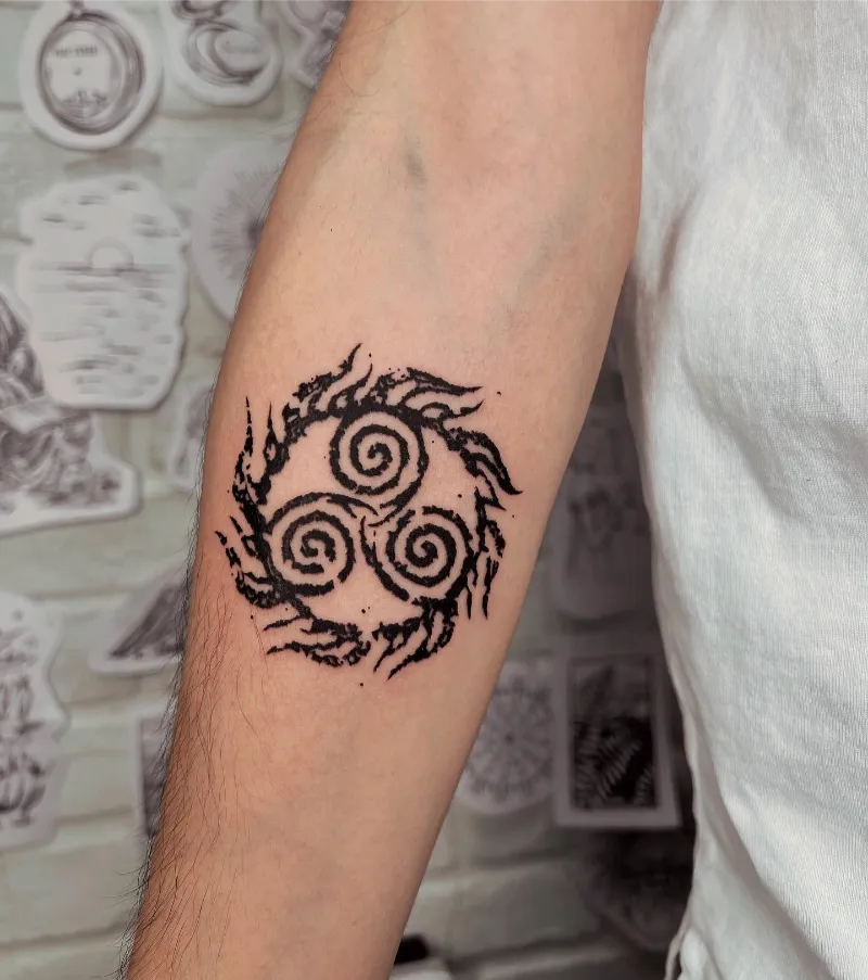 Tribal Style Triskele Tattoo