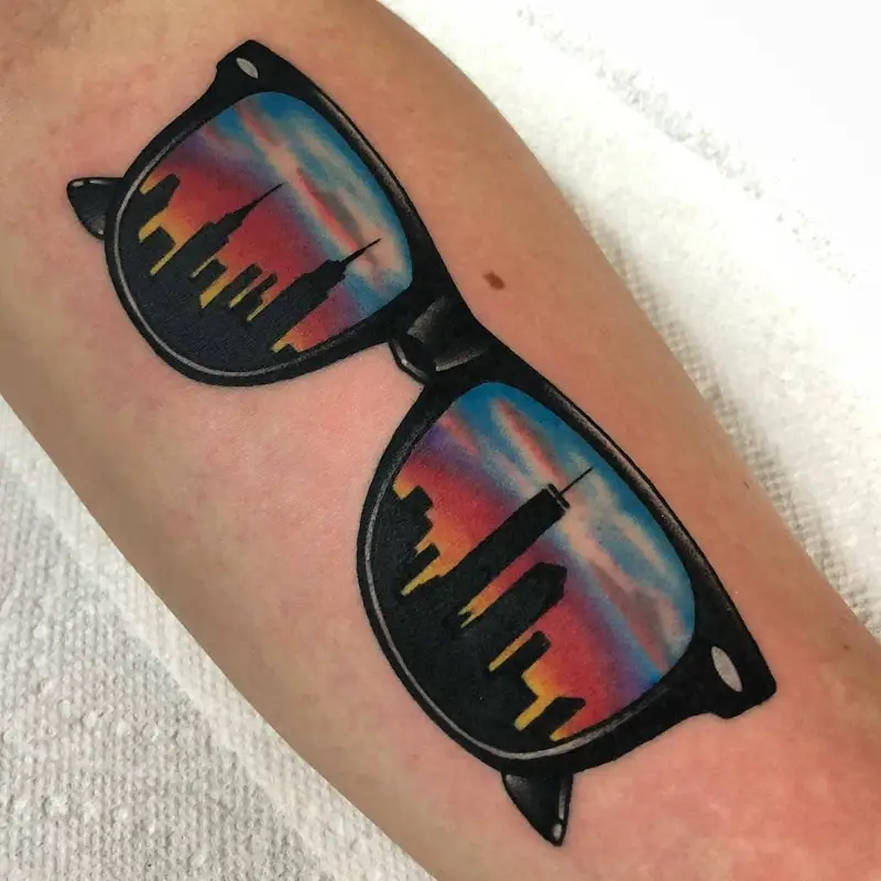 Vibrant Sunglasses Reflecting New York Skyline Tattoo