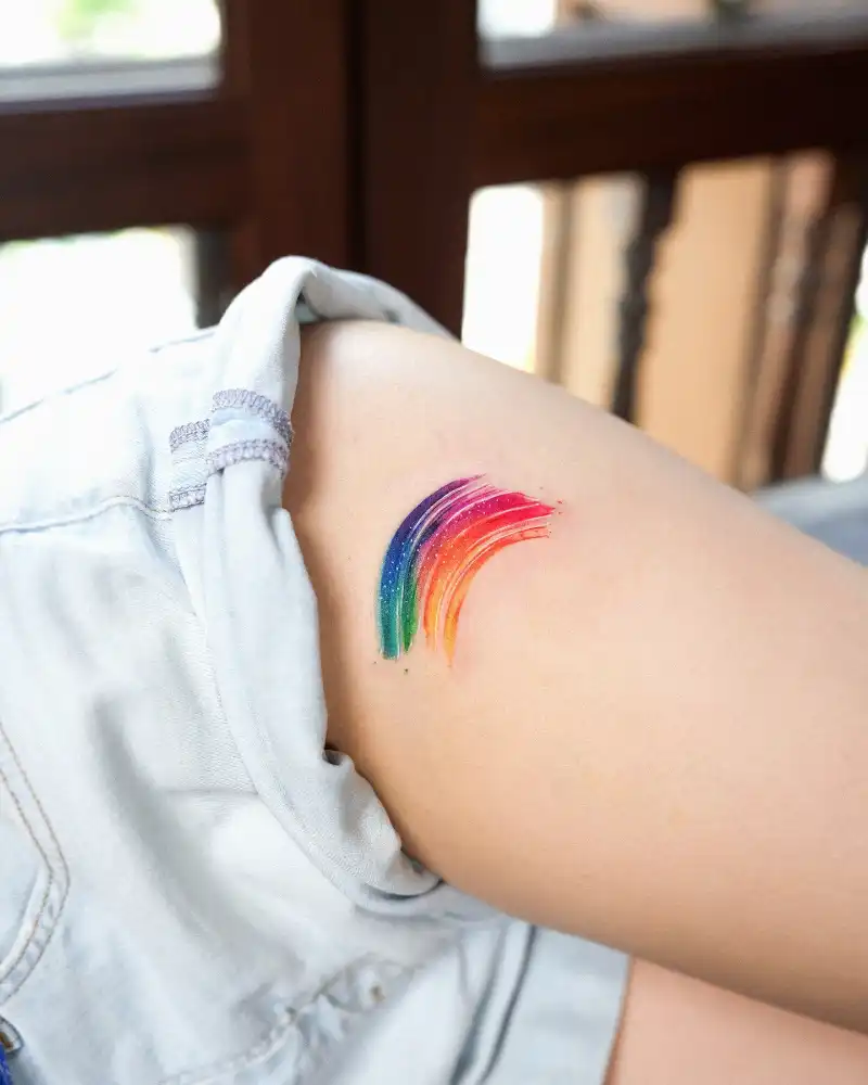 Watercolor Rainbow Starry Arc Tattoo