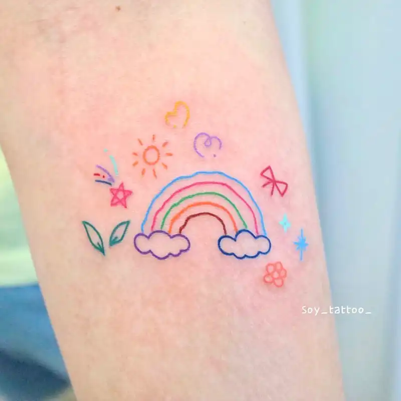 Whimsical Doodle Rainbow Tattoo
