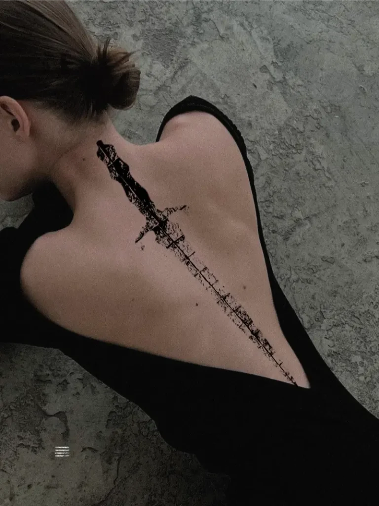 Abstract Grunge Sword Spine Tattoo