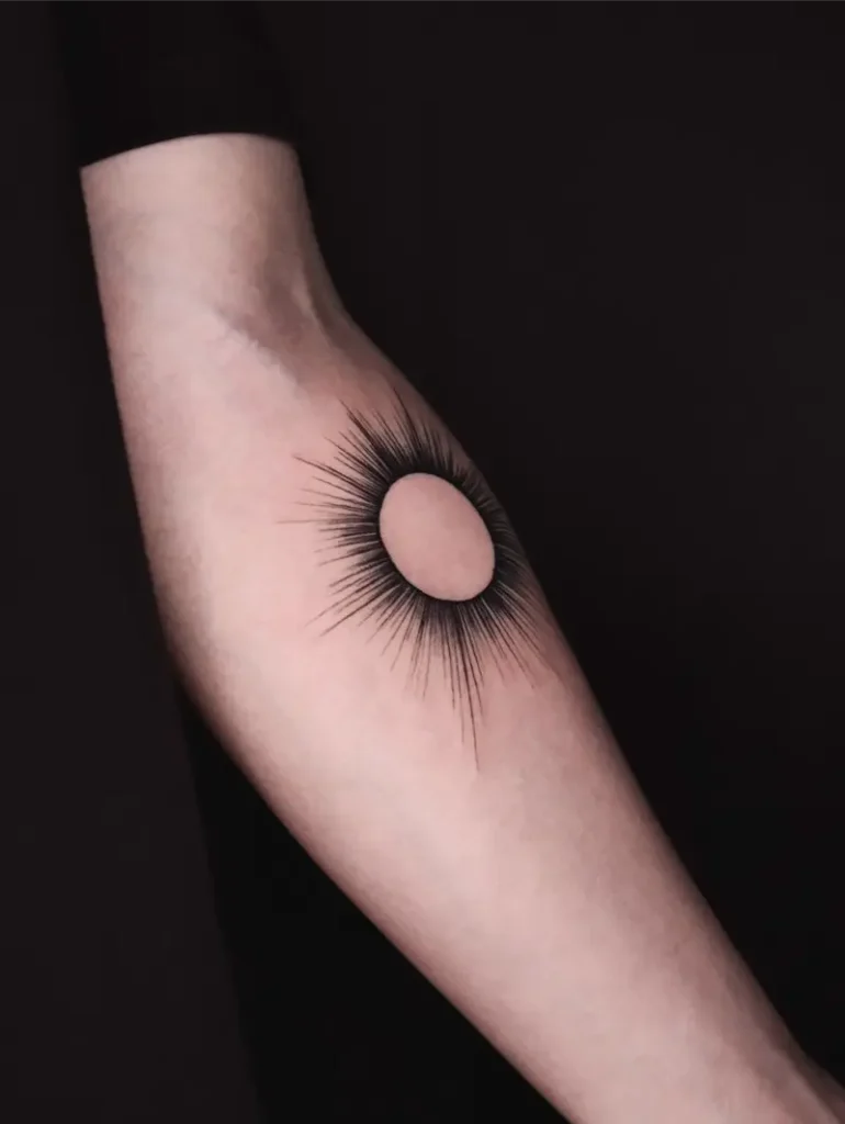 Black Radiating Sun Circle Tattoo