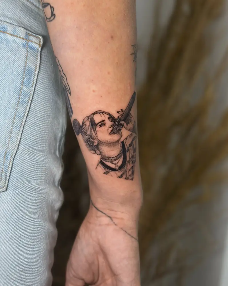 Black and Grey Singing Billie Eilish Performance Tattoo