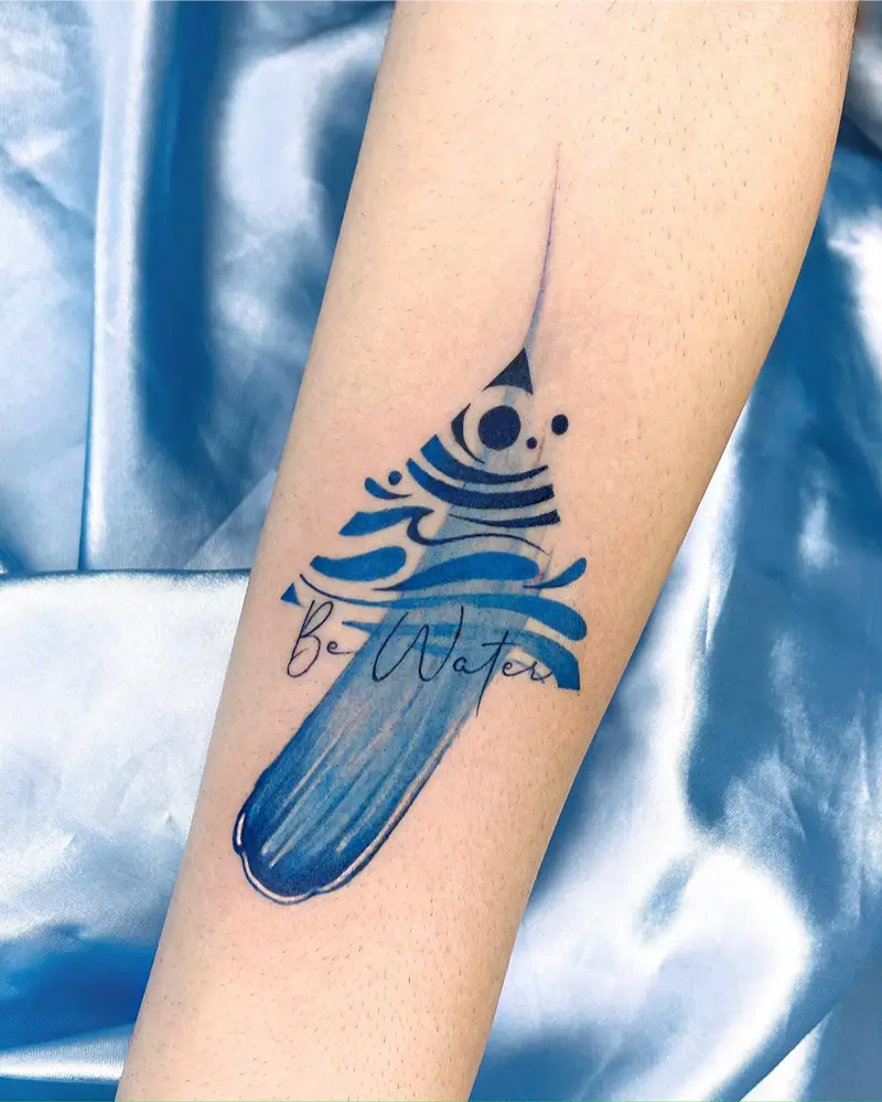Blue Brushstroke Triangle Tattoo