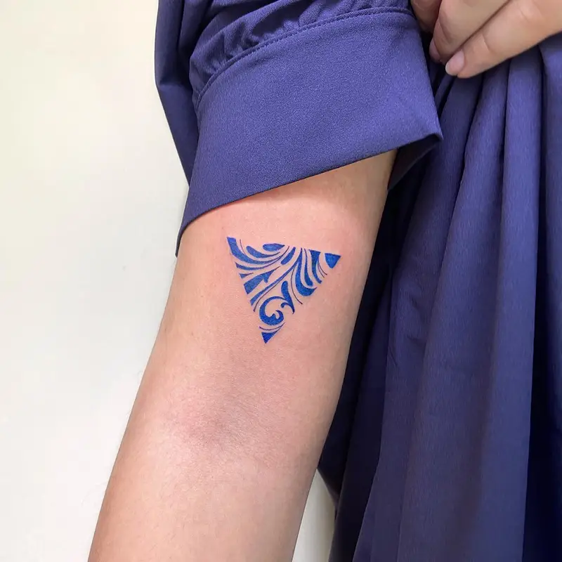 Blue Swirl Triangle Tattoo