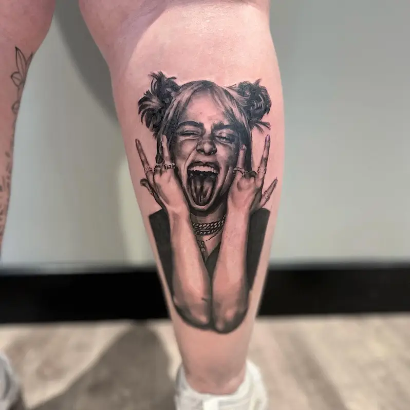Bold Black and Grey Billie Eilish Rebel Portrait Tattoo
