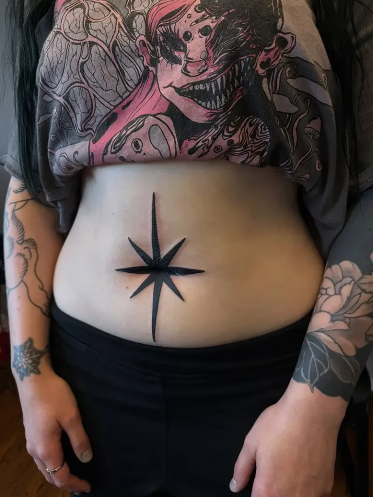 Bold Blackwork Compass Star Belly Tattoo