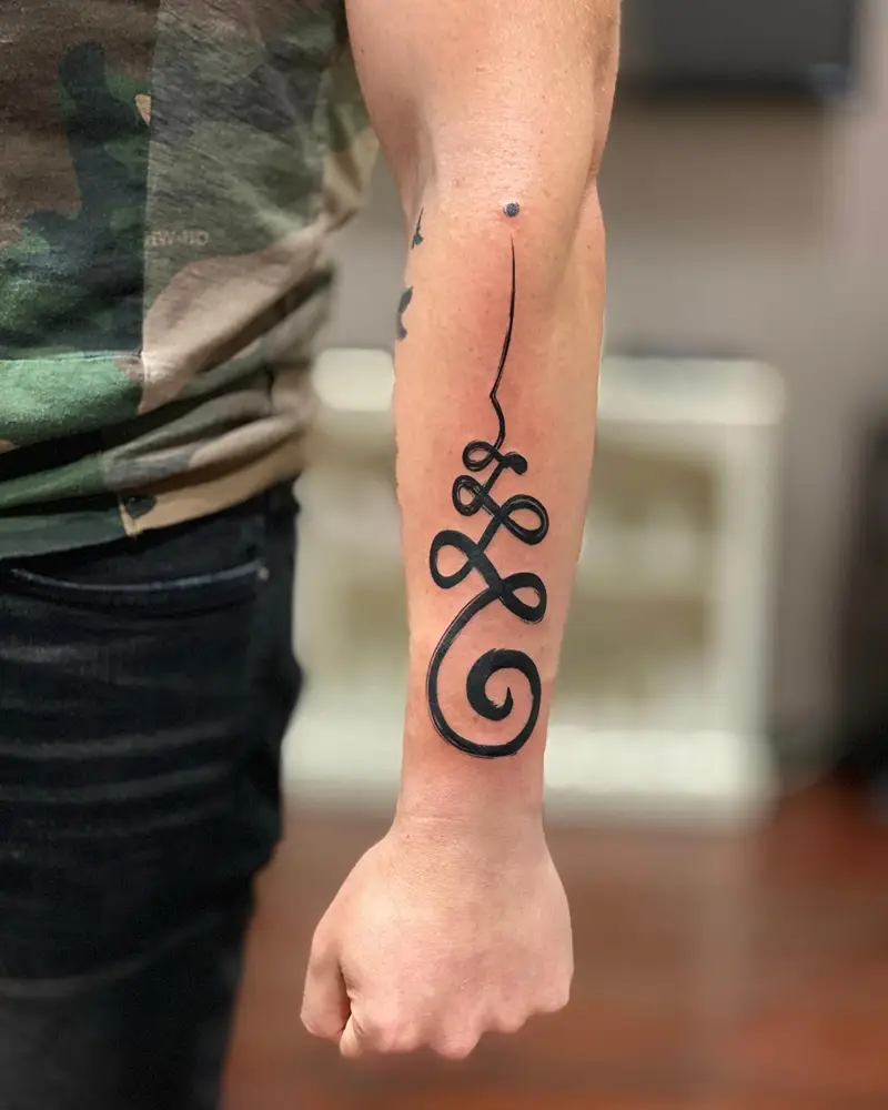Bold Blackwork Unalome Forearm Tattoo
