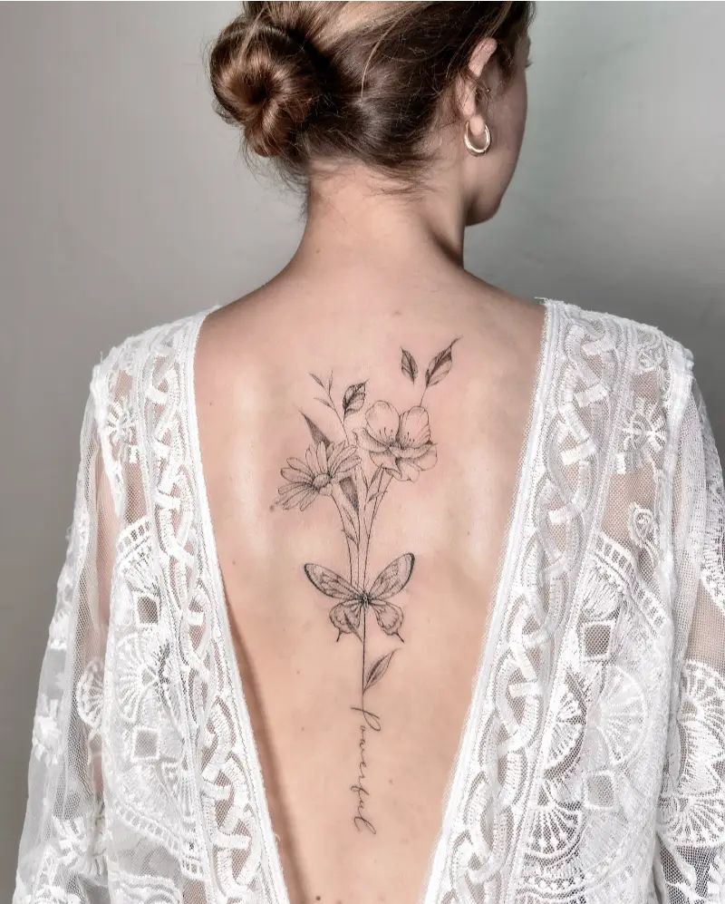 Botanical Butterfly Spine Tattoo