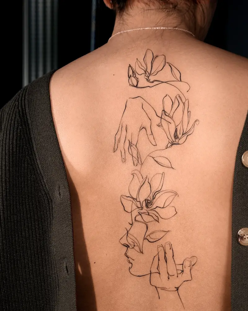 Botanical Line Art Face Spine Tattoo