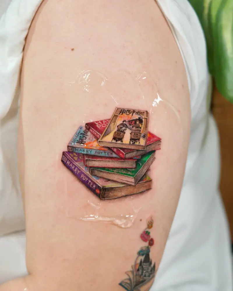 Colorful Harry Potter Book Stack Tattoo