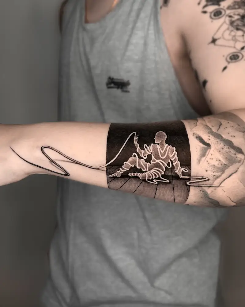 Conceptual Rope Figure Forearm Tattoo