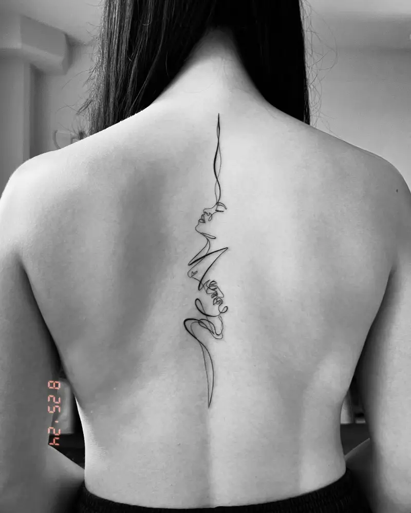 Continuous Line Face Spine Tattoo