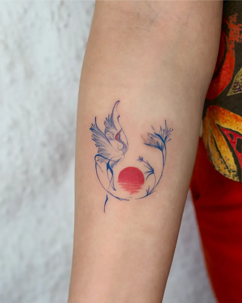 Crane and Red Sun Circle Tattoo