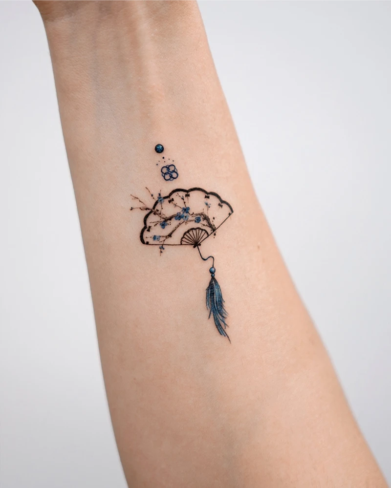 Delicate Blue Blossom Fan Tattoo