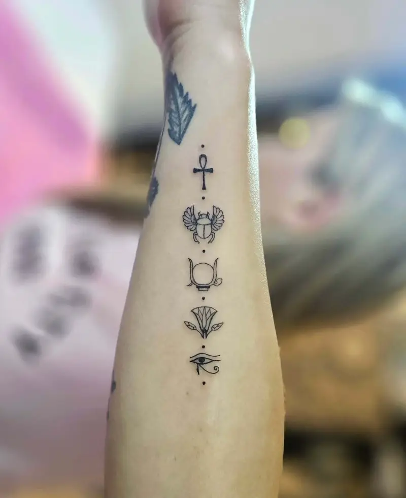 Delicate Egyptian Symbol Sleeve Tattoo