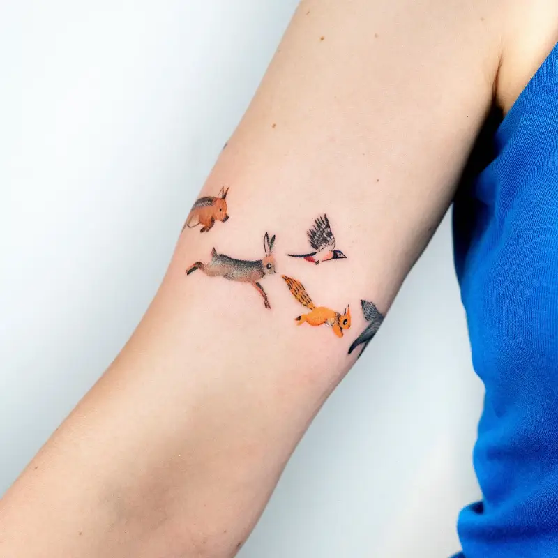 Delicate Wildlife Scene Squirrel Tattoo