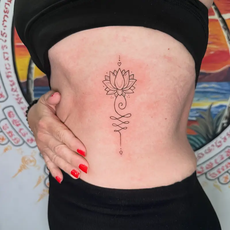 Elegant Lotus Unalome Side Tattoo