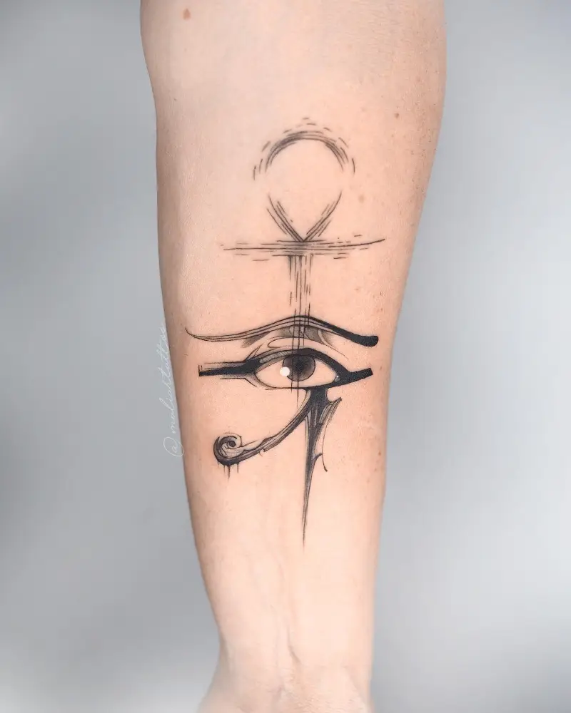 Expressive Eye of Horus Ankh Tattoo