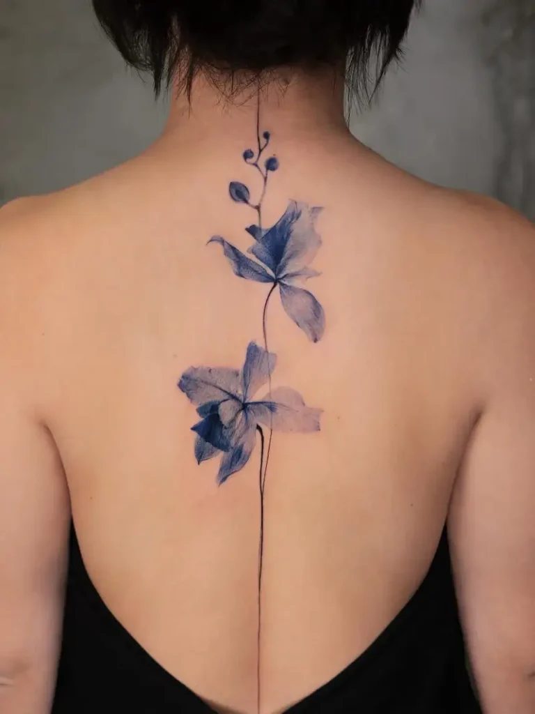 Fine Line Blue Floral Spine Tattoo