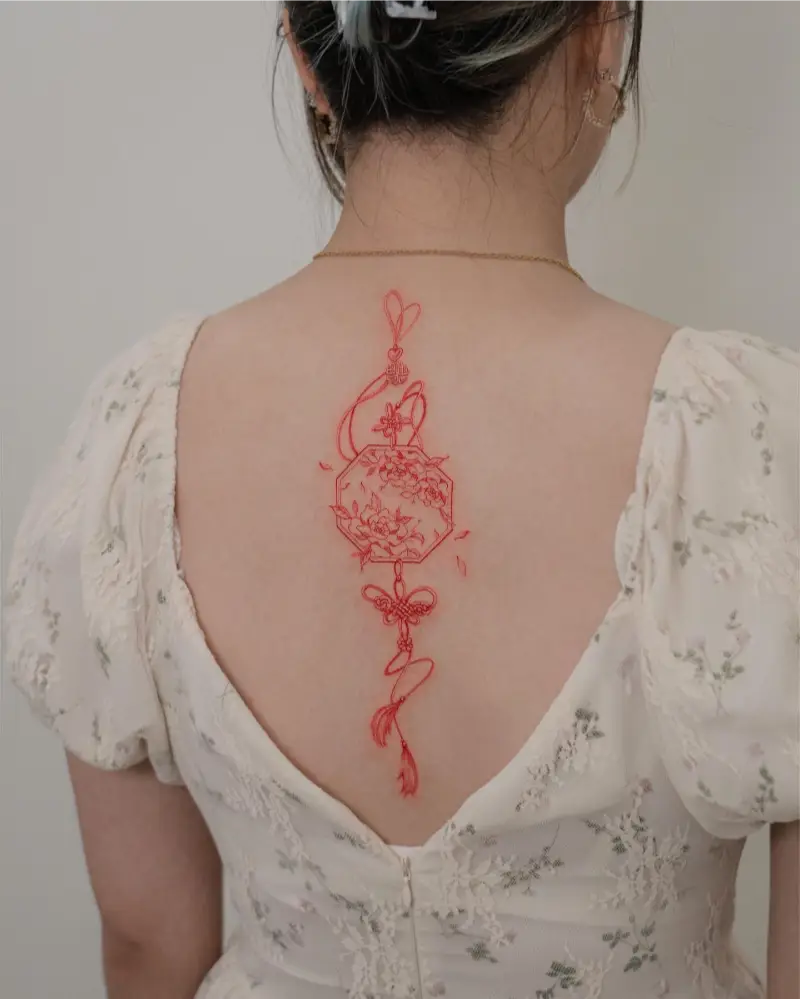 Fine Line Chinese Ornament Spine Tattoo