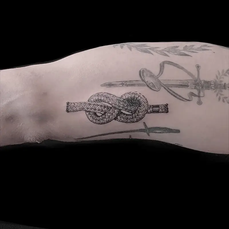 Fine Line Decorative Rope Knot Tattoo