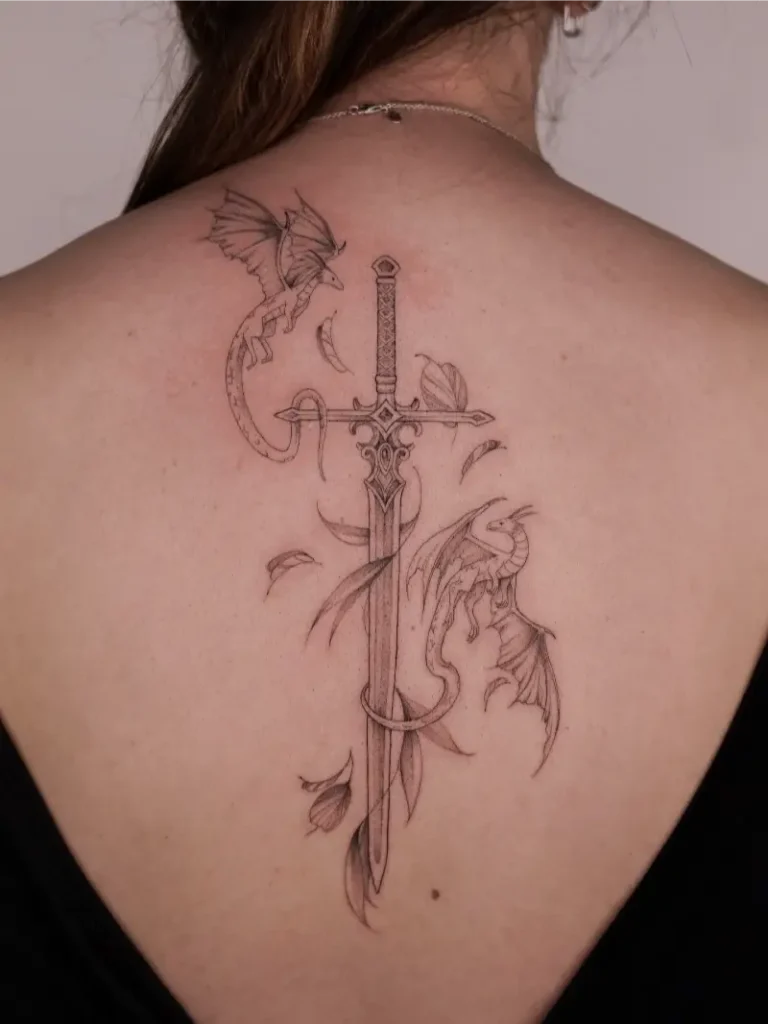 Fine Line Fantasy Sword and Dragon Spine Tattoo