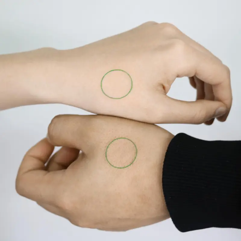 Fine Line Matching Green Circle Tattoos
