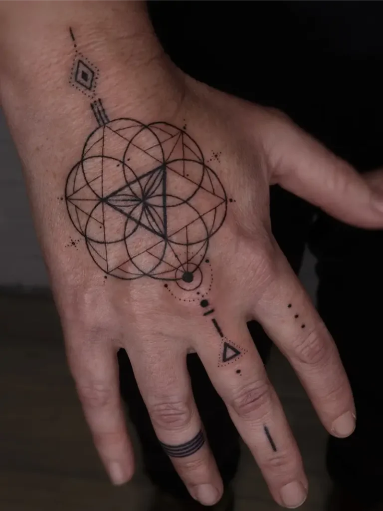 Fine Line Metatron's Cube Flower of Life Hand Tattoo