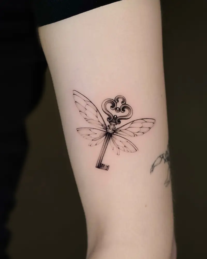 Fine Line Winged Flying Key Tattoo