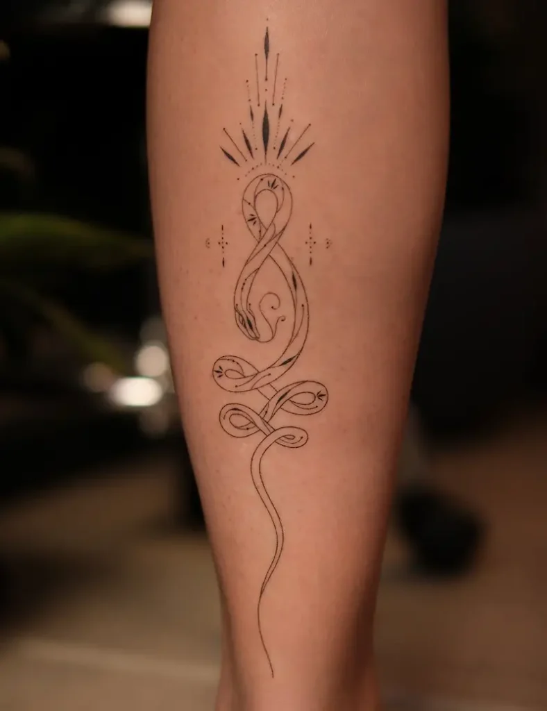 Flowing Snake Unalome Tattoo