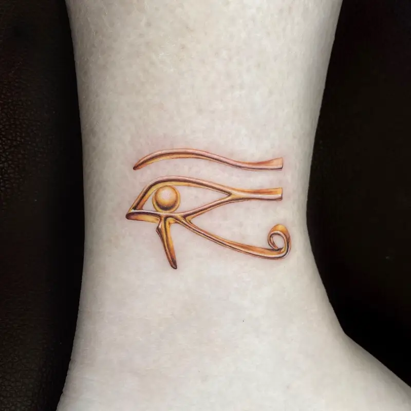 Golden Minimalist Eye of Horus Tattoo