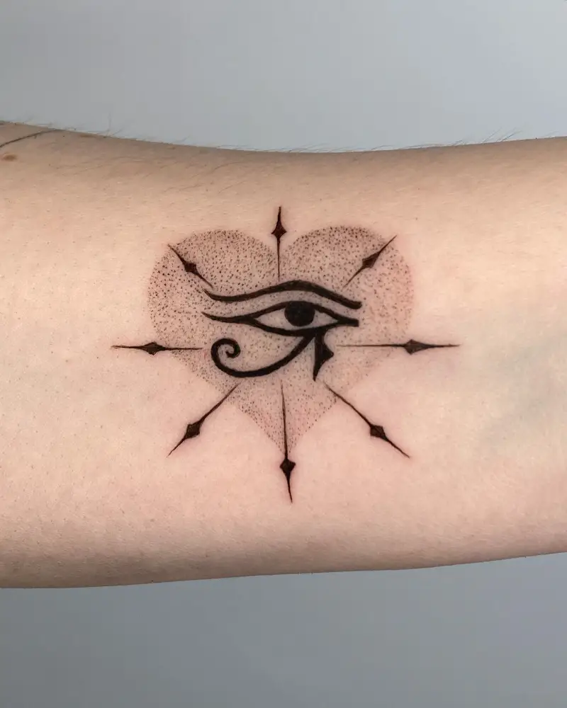 Heart-Shaped Eye of Horus Tattoo
