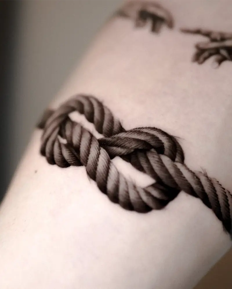 Hyper Realistic Double Fisherman's Knot Tattoo