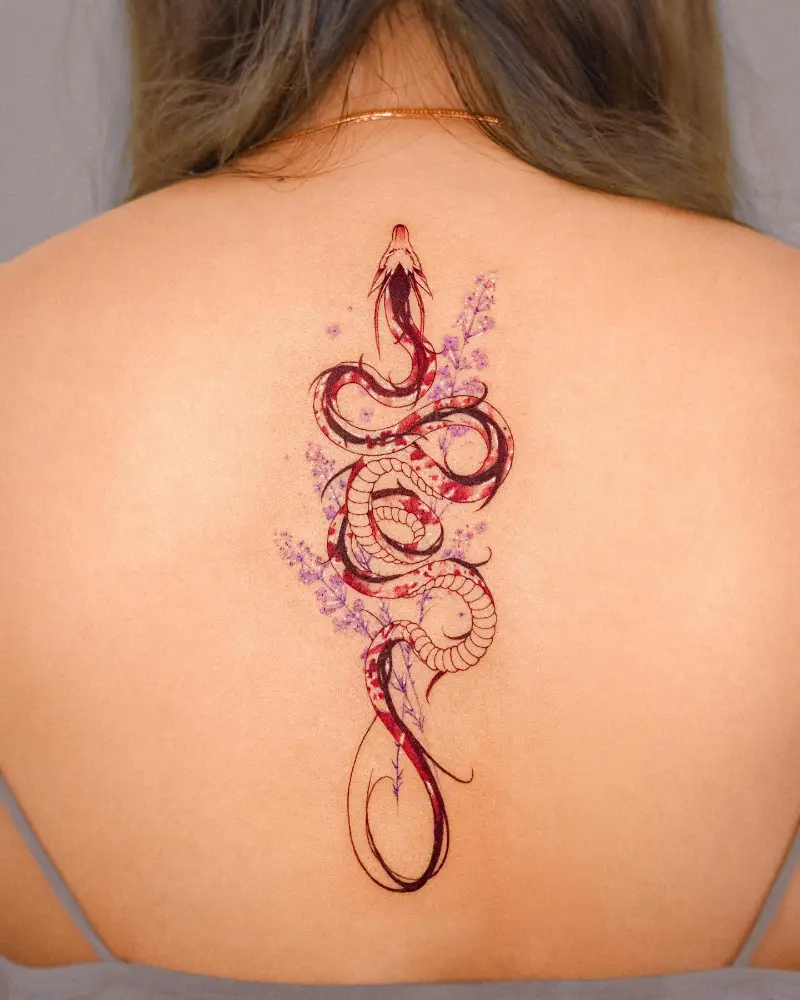 Illustrative Crimson Snake Spine Tattoo