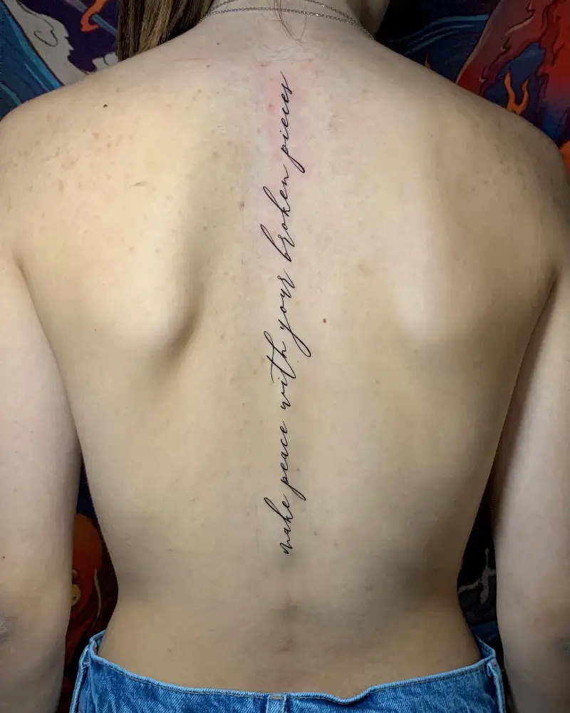 Inspirational Quote Spine Tattoo