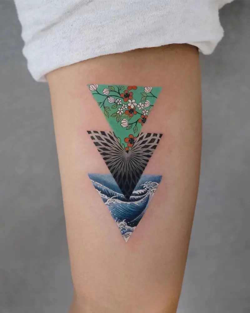 Layered Geometric Triangle Tattoo