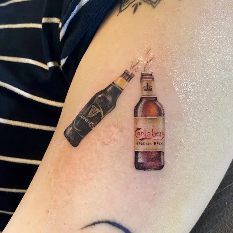 Micro Realism Guinness and Carlsberg Bottle Tattoo