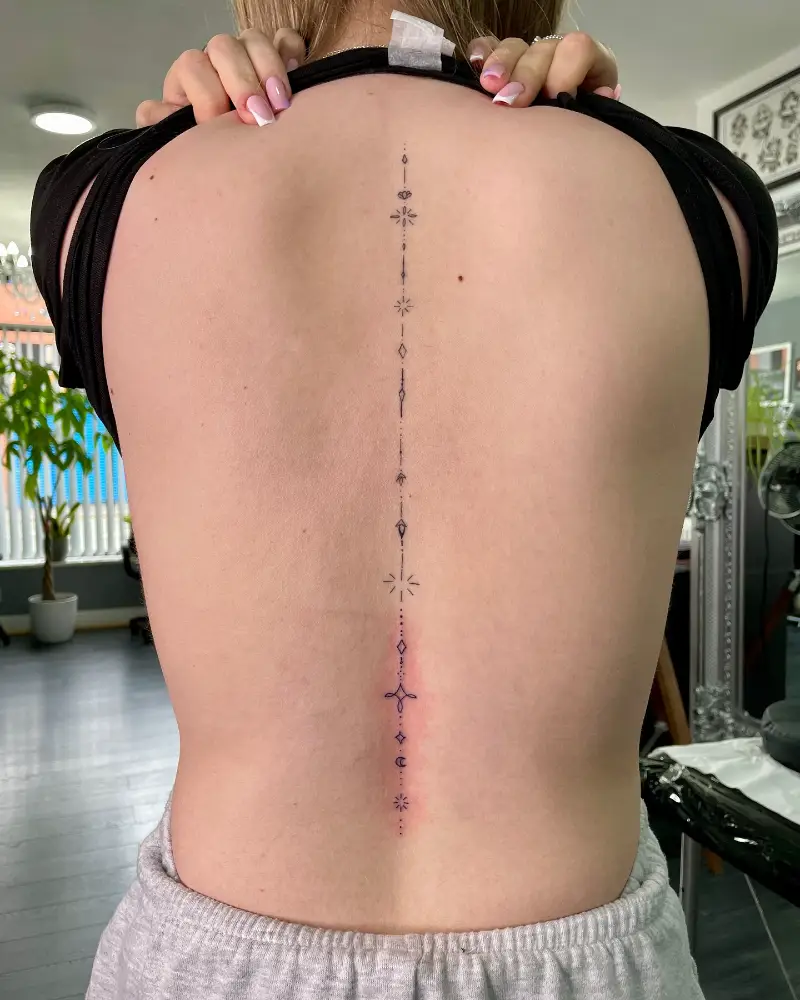 Minimal Geometric Spine Tattoo