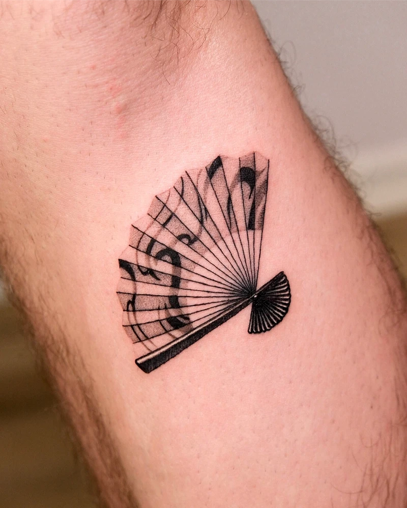 Minimalist Blackwork Portrait Fan Tattoo