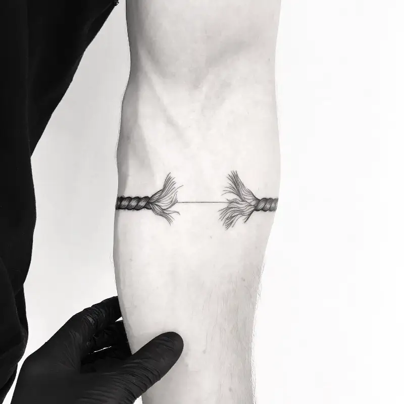 Minimalist Broken Rope Bracelet Tattoo