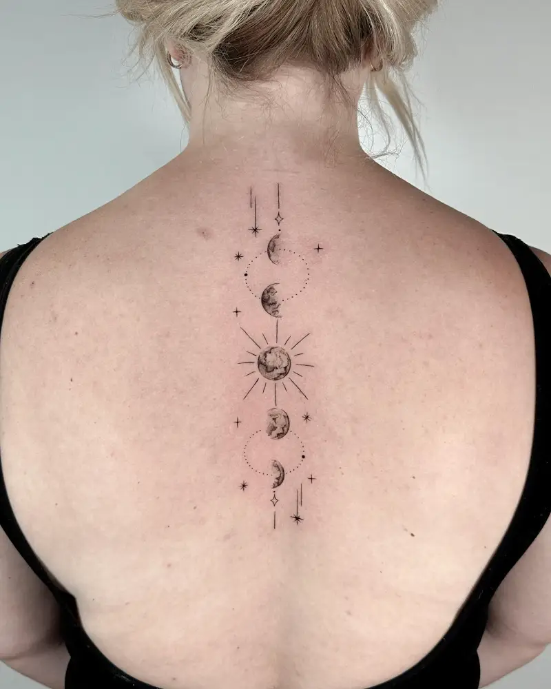 Minimalist Celestial Moon Phase Spine Tattoo
