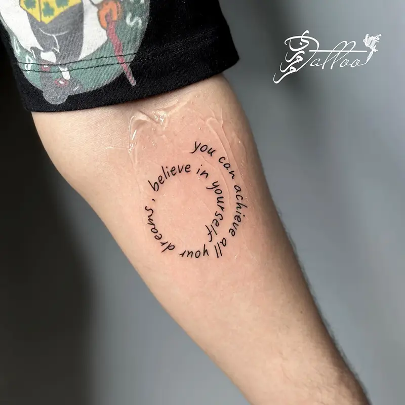 Minimalist Circular Quote Tattoo