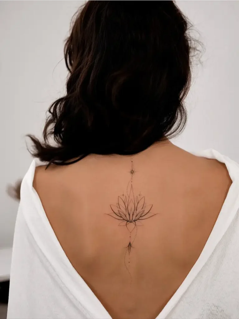 Minimalist Geometric Lotus Spine Tattoo