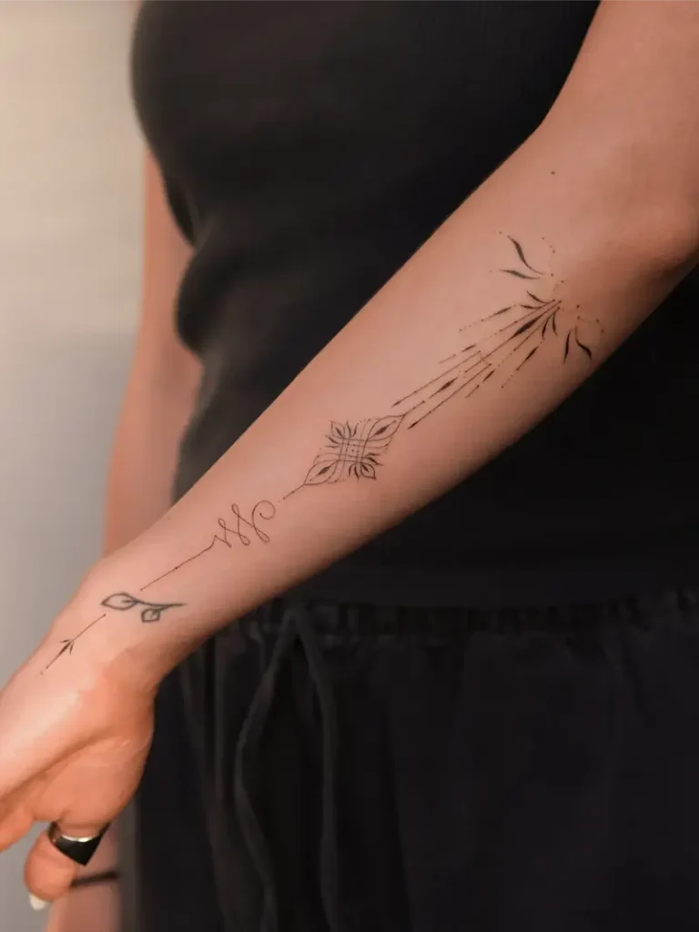 Minimalist Ornamental Unalome Line Tattoo
