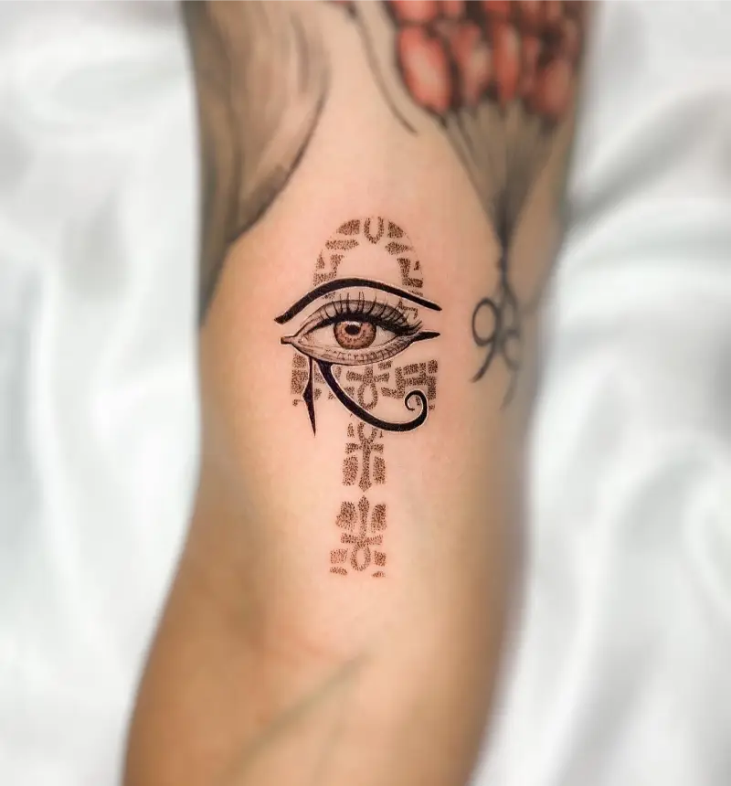 Ornamental Eye of Horus Cross Tattoo