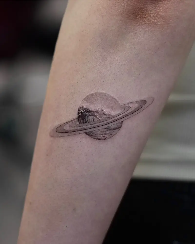 Realistic Ocean Wave Planet Tattoo